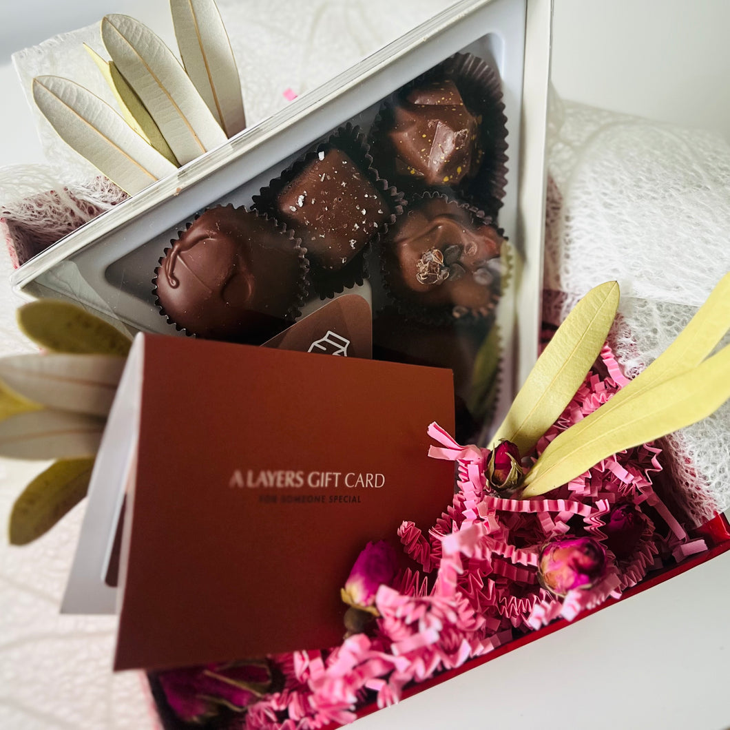 Image of Valentine's Day flowers, chocolate, and spa treatment gift box in Fort McMurray. 